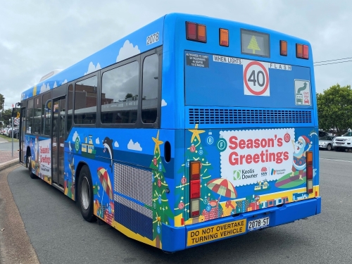 christmas bus with summery santa exterior wrap